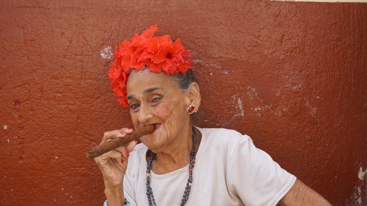 Old Woman Smoking a Cigar on the Streets of Havana